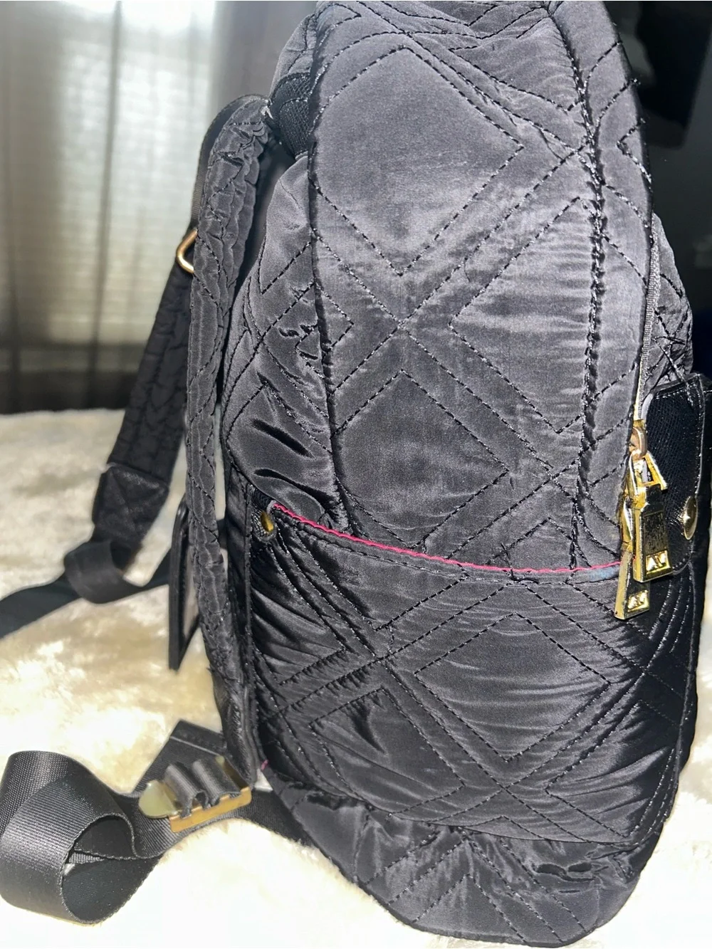 Adrienne Vittadini Black Quilted Backpack with Gold Accents